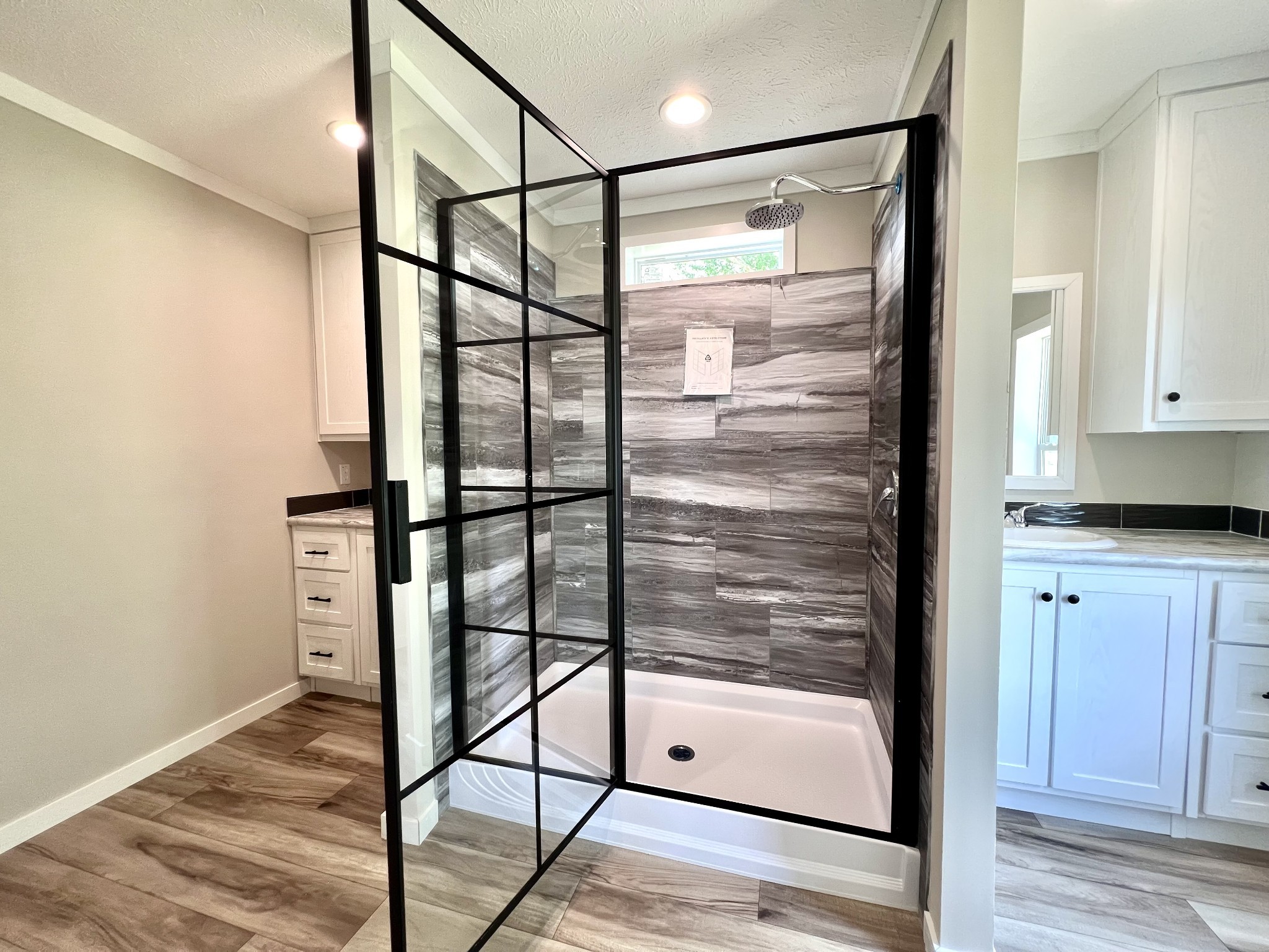 1081 McAfee Road Morrison, TN 37357 - Photo 25 of 39 a bathroom with a glass shower door