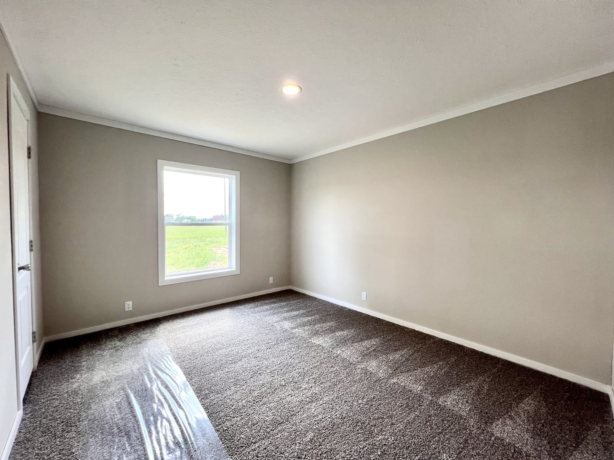 1081 McAfee Road Morrison, TN 37357 - Photo 29 of 39 an empty room with a window