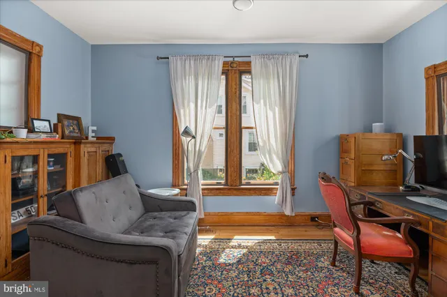 a kitchen with stainless steel appliances a stove a sink and a refrigerator