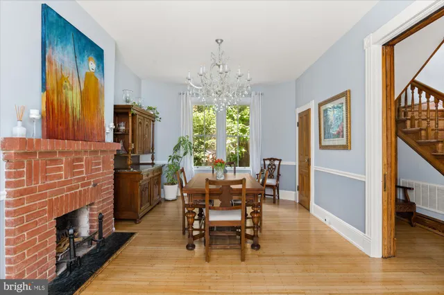 a view of a porch with furniture and a yard