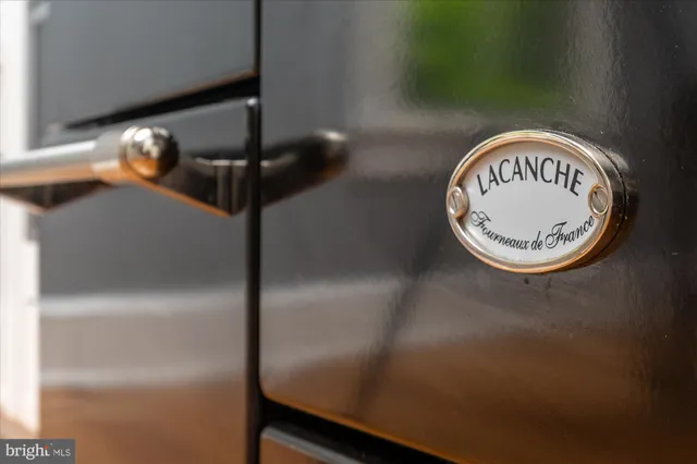 a living room with furniture a window and a fireplace
