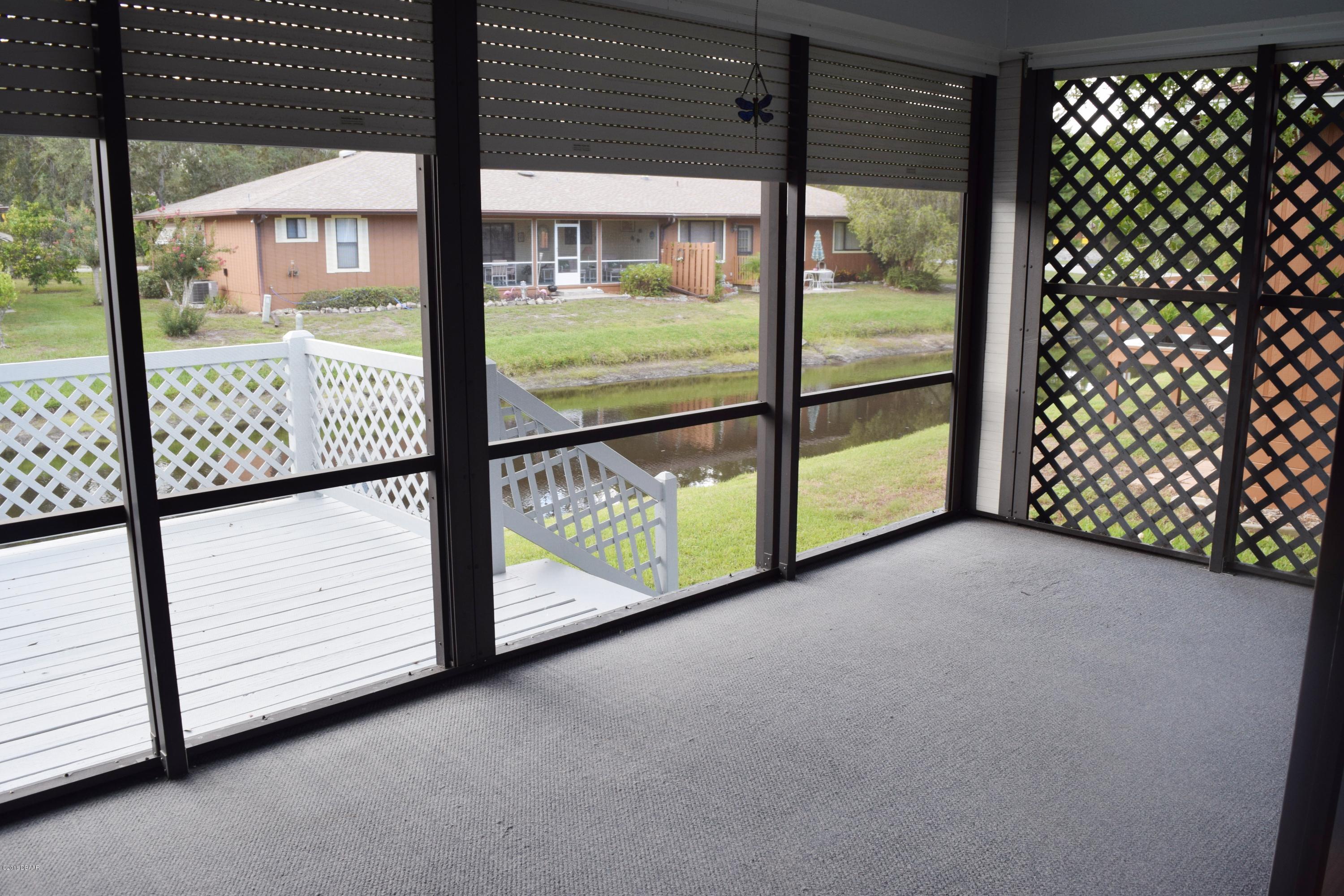104 Rustic Pond Road Port Orange, FL 32128 - Photo 14 of 17 Screen Patio