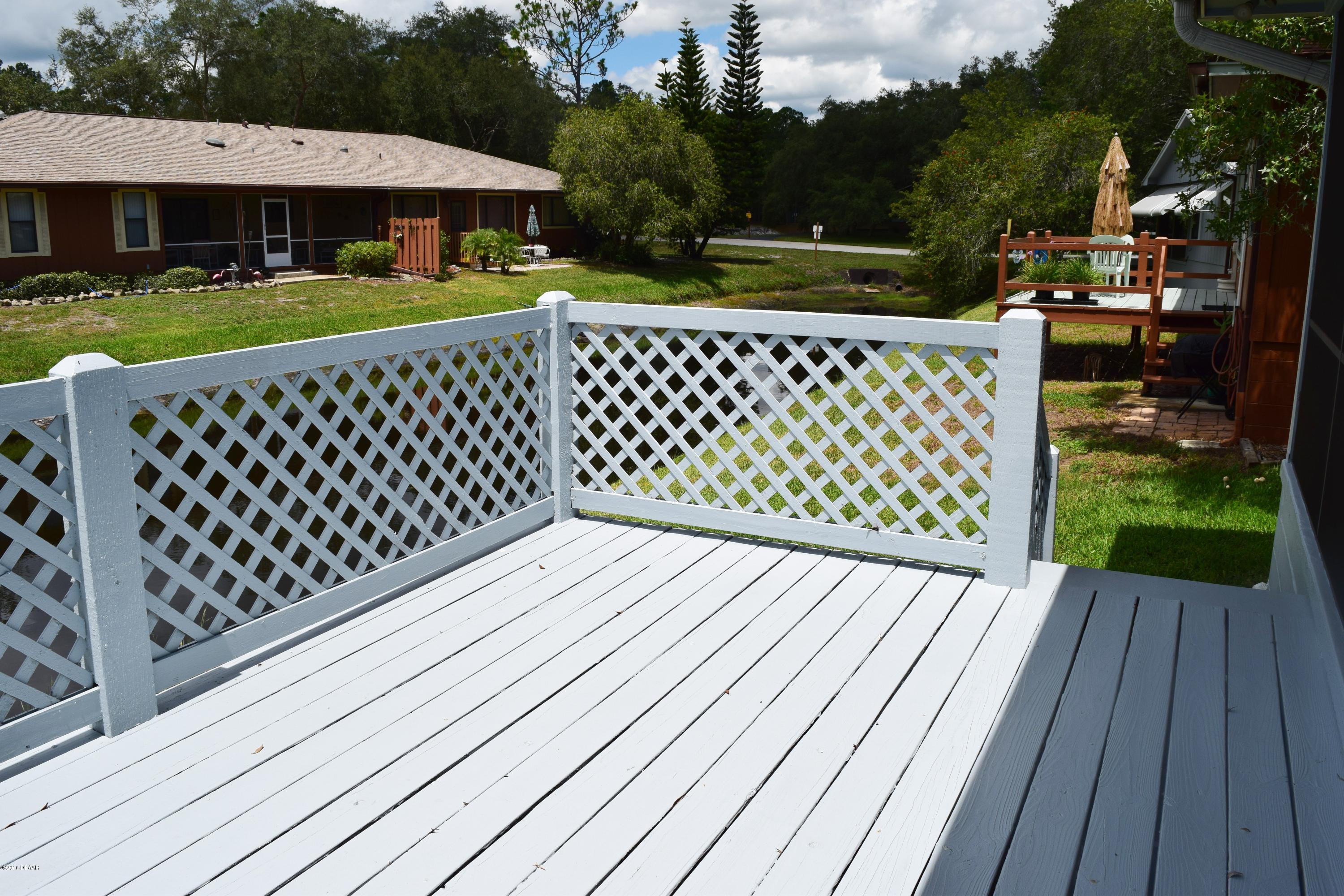 104 Rustic Pond Road Port Orange, FL 32128 - Photo 15 of 17 wood deck again
