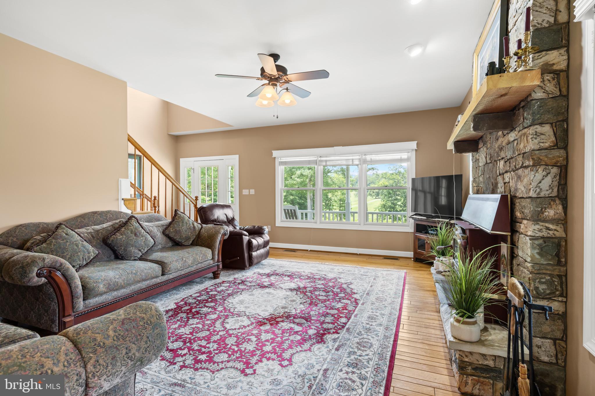 1688 Desert Road Reva, VA 22735 - Photo 16 of 81 a living room with furniture and a fireplace