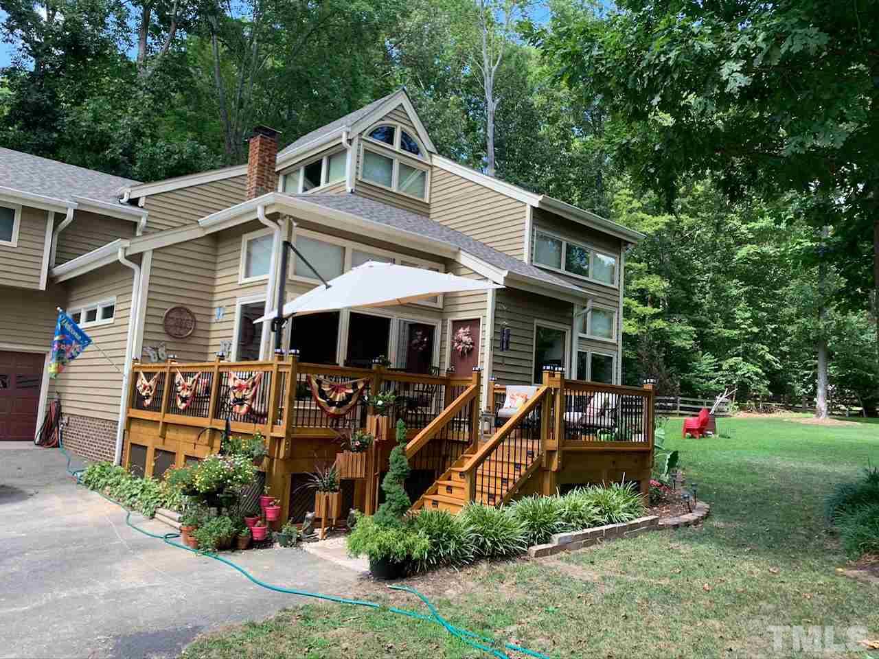 11940 Straight A Way Lane Raleigh, NC 27613 - Photo 1 of 4 front view of house with a yard