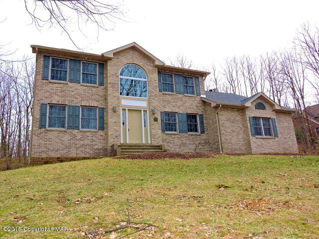 248 Pin Oak Road Stroudsburg, PA 18360 - Photo 1 of 33 a front view of a house with a yard