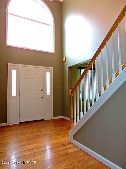 248 Pin Oak Road Stroudsburg, PA 18360 - Photo 2 of 33 a view of staircase with wooden floor and stairs