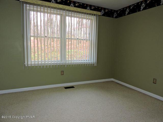 248 Pin Oak Road Stroudsburg, PA 18360 - Photo 25 of 33 an empty room with a window