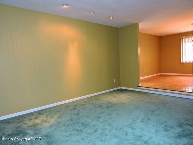 248 Pin Oak Road Stroudsburg, PA 18360 - Photo 4 of 33 an empty room with a natural light