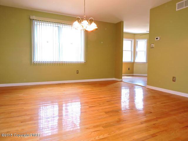 248 Pin Oak Road Stroudsburg, PA 18360 - Photo 5 of 33 a view of empty room with wooden floor and fan