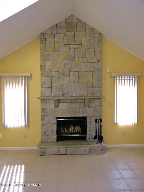 248 Pin Oak Road Stroudsburg, PA 18360 - Photo 6 of 33 an empty room with windows