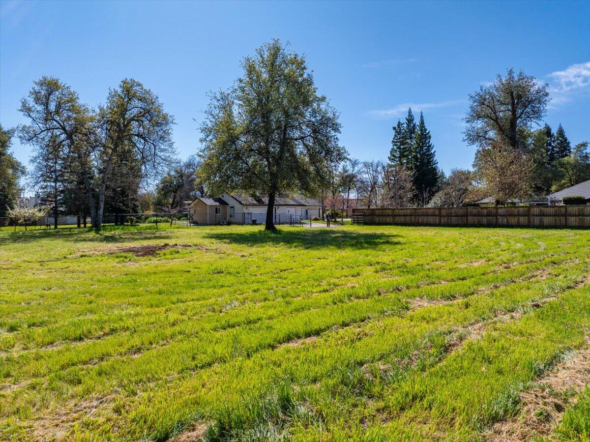 0 Riata Drive Redding, CA 96002 - Photo 27 of 28 a swimming pool that is in the middle of a field
