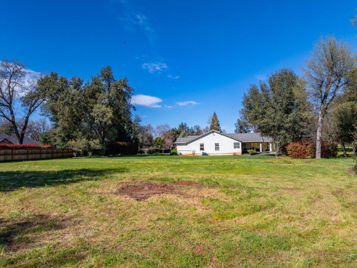 0 Riata Drive Redding, CA 96002 - Photo 28 of 28 a front view of a house with a yard and trees