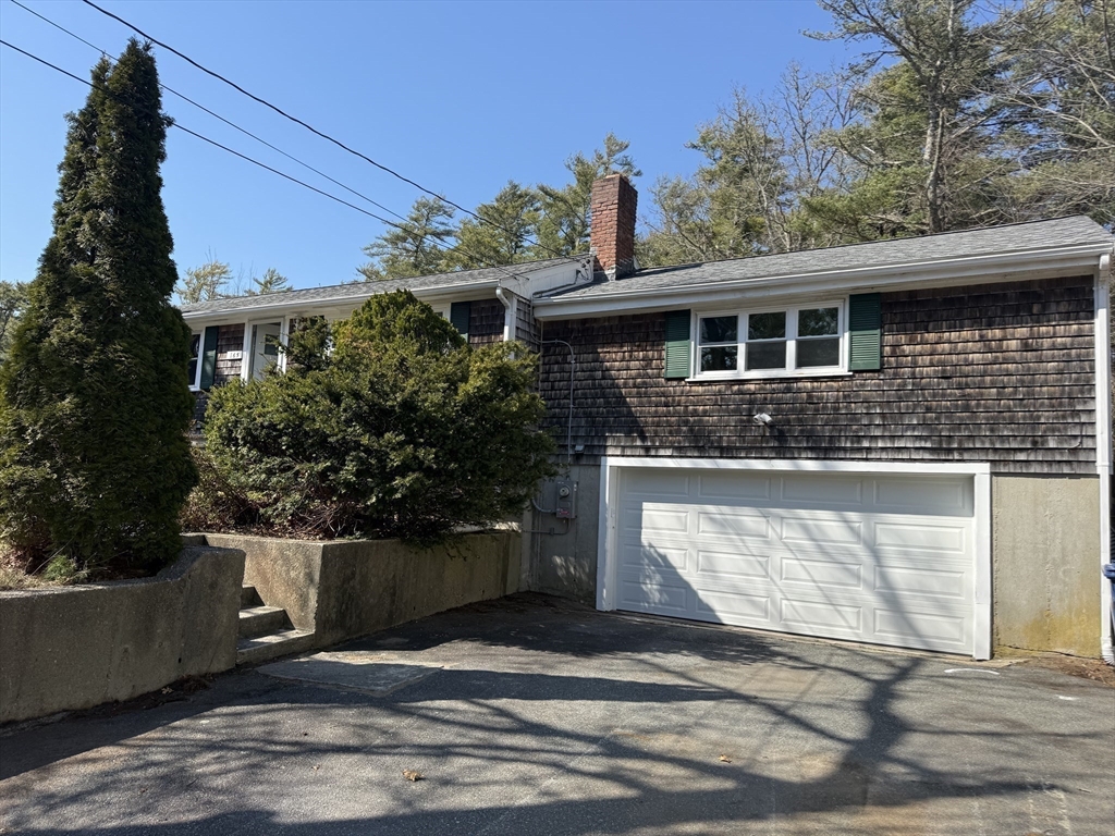 165 Hedges Pond Road Plymouth, MA 02360 - Photo 3 of 20 a front view of a house with a yard