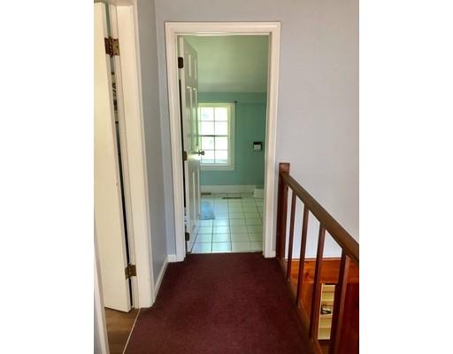 27 Stage Road Westhampton, MA 01027 - Photo 15 of 38 a view of a hallway with windows and stairs