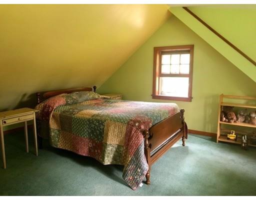27 Stage Road Westhampton, MA 01027 - Photo 19 of 38 a bed sitting in a bedroom next to a window
