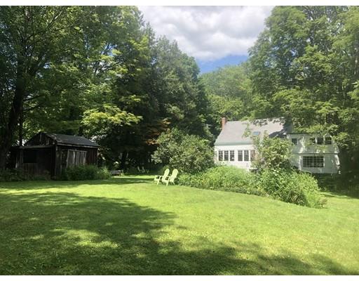 27 Stage Road Westhampton, MA 01027 - Photo 3 of 38 a backyard of a house with lots of green space