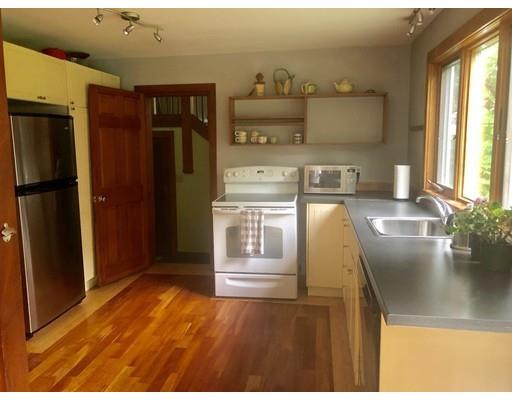 27 Stage Road Westhampton, MA 01027 - Photo 6 of 38 a kitchen with stainless steel appliances granite countertop a refrigerator a stove and a sink with large window