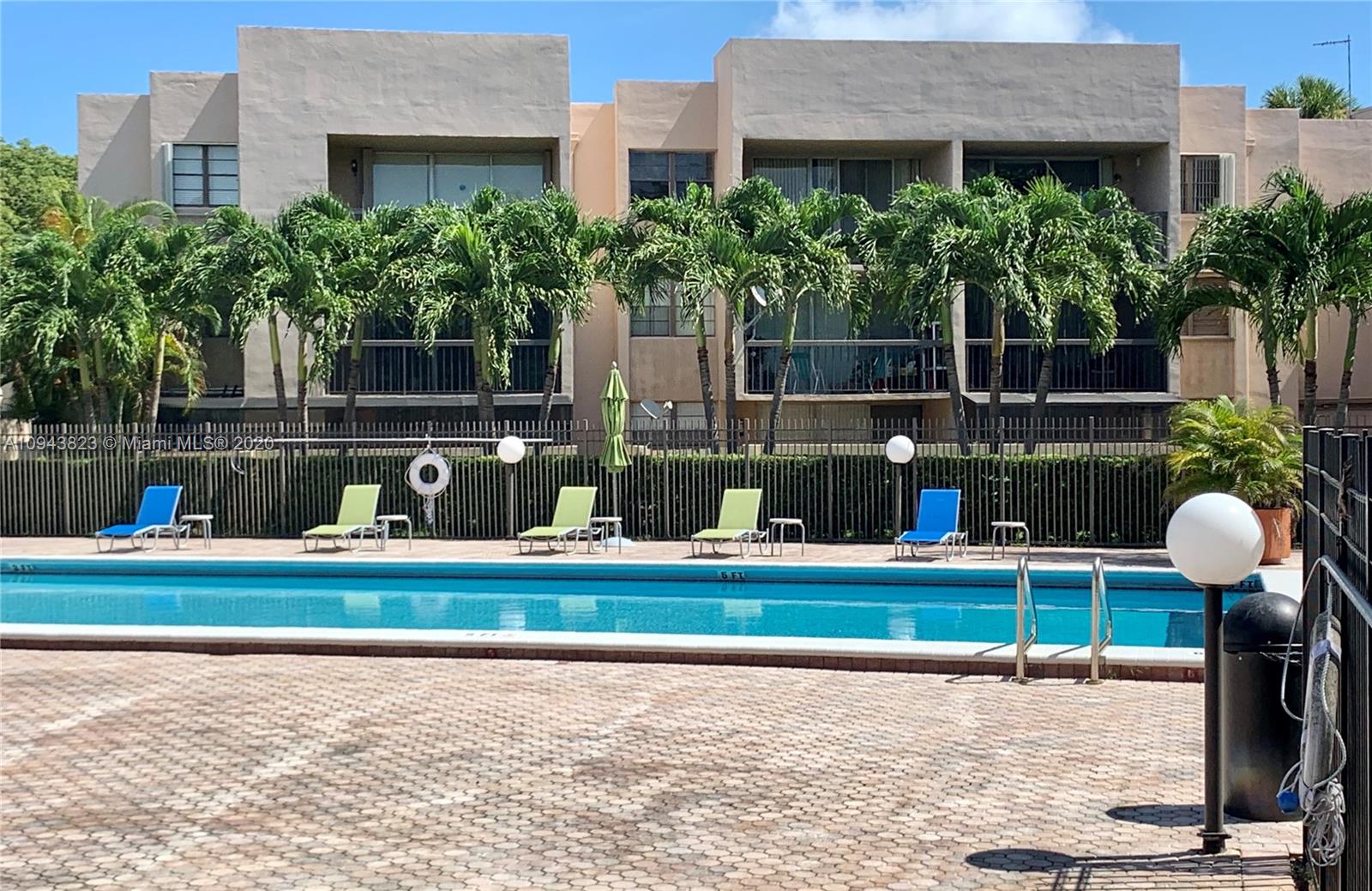 10975 Southwest 107th Street, Unit 117 Miami, FL 33176 - Photo 4 of 13 a house view with a garden space