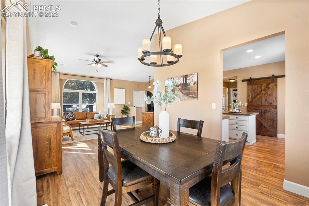 16145 Turftop Terrace Elbert, CO 80106 - Photo 12 of 42 Convenient dining room to host or entertain!