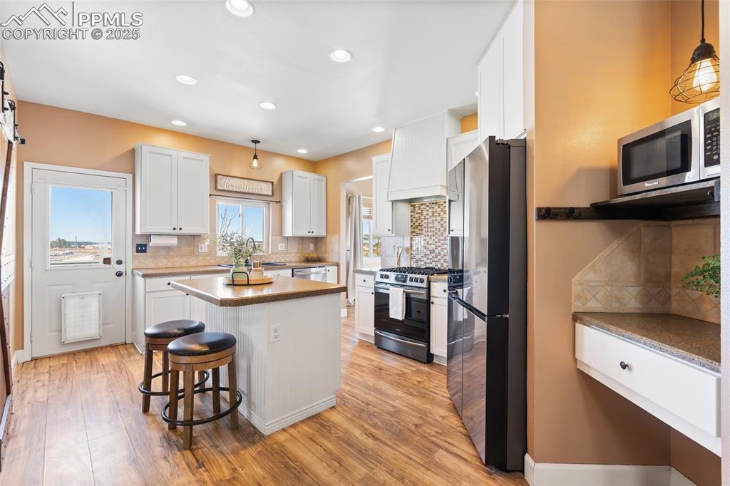 16145 Turftop Terrace Elbert, CO 80106 - Photo 14 of 42 Updated kitchen with stainless steel appliances, large pantry and island!
