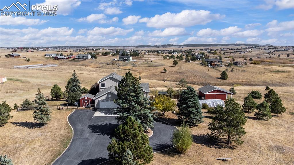 16145 Turftop Terrace Elbert, CO 80106 - Photo 40 of 42 Newly paved asphalt driveway, with trees and views!