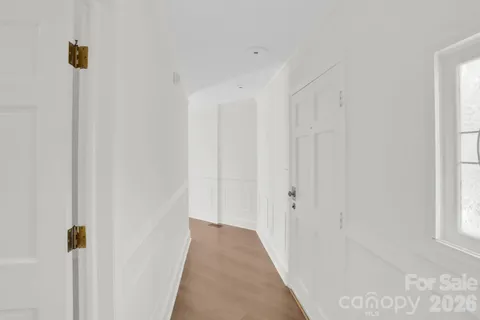 a view of a livingroom with wooden floor