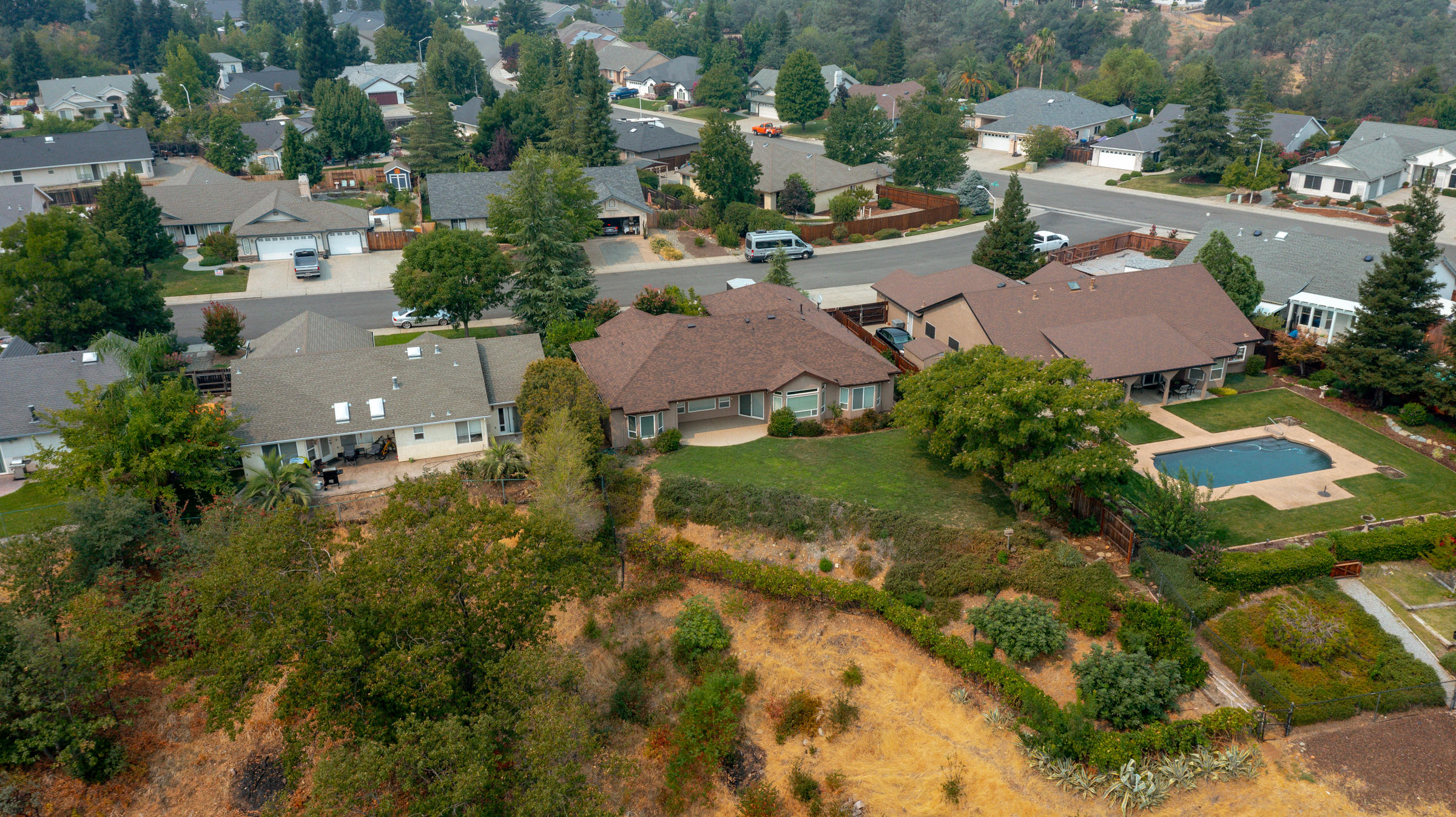 2965 Shadow Brook Lane Redding, CA 96001 - Photo 36 of 38 an aerial view of residential houses with outdoor space
