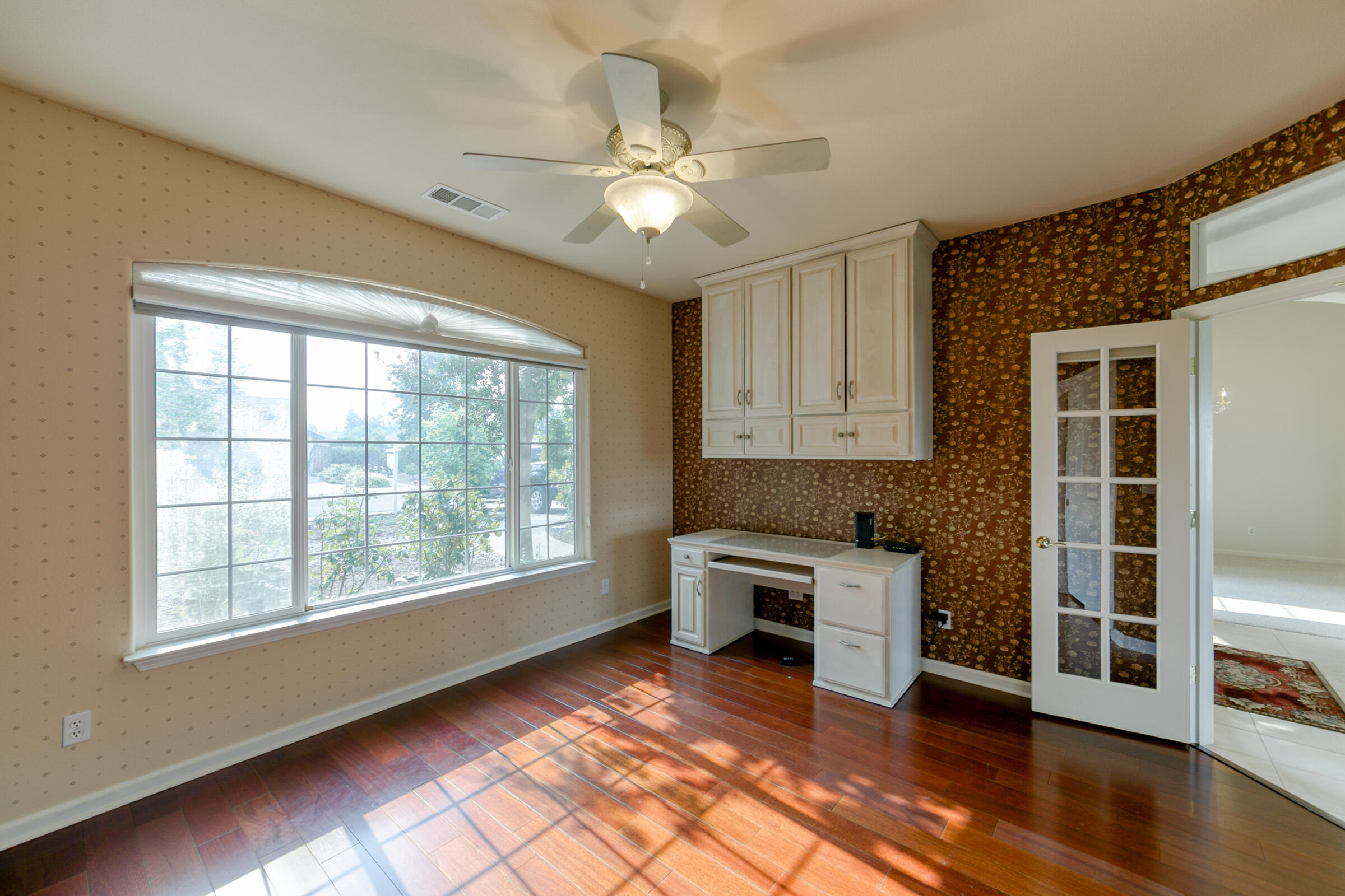 2965 Shadow Brook Lane Redding, CA 96001 - Photo 7 of 38 a view of a livingroom with furniture window and wooden floor