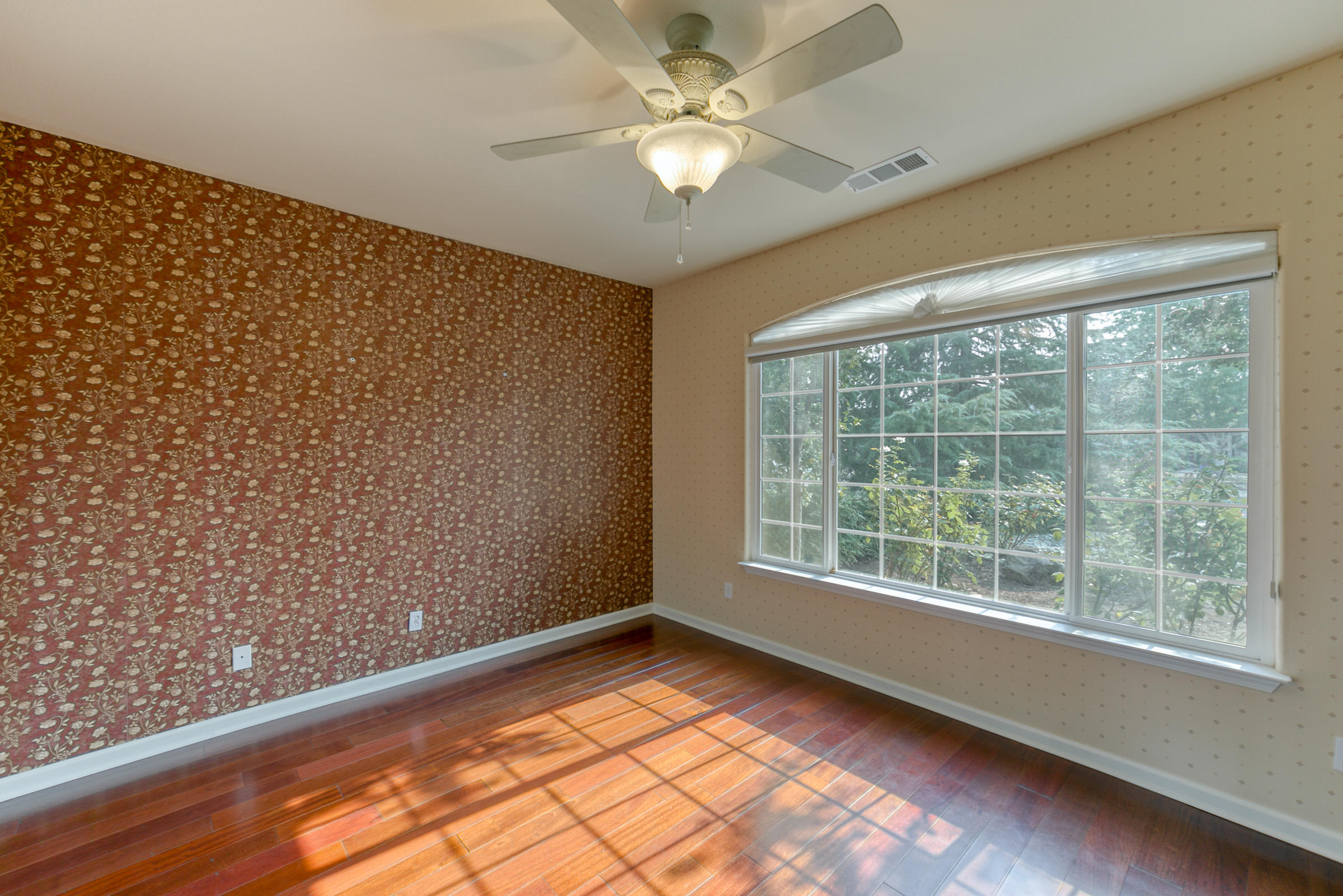 2965 Shadow Brook Lane Redding, CA 96001 - Photo 8 of 38 a view of an empty room with a window