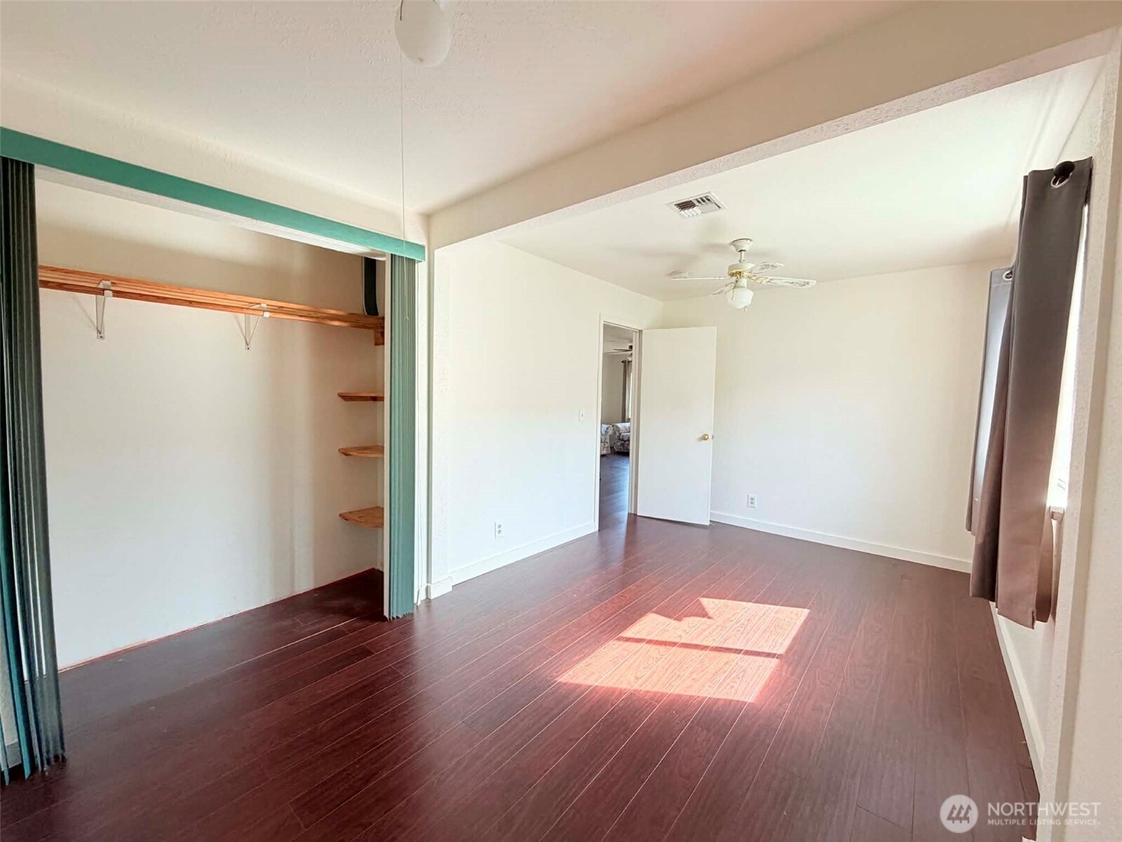 2006 West Second Street Aberdeen, WA 98520 - Photo 29 of 39 a view of empty room with wooden floor and window