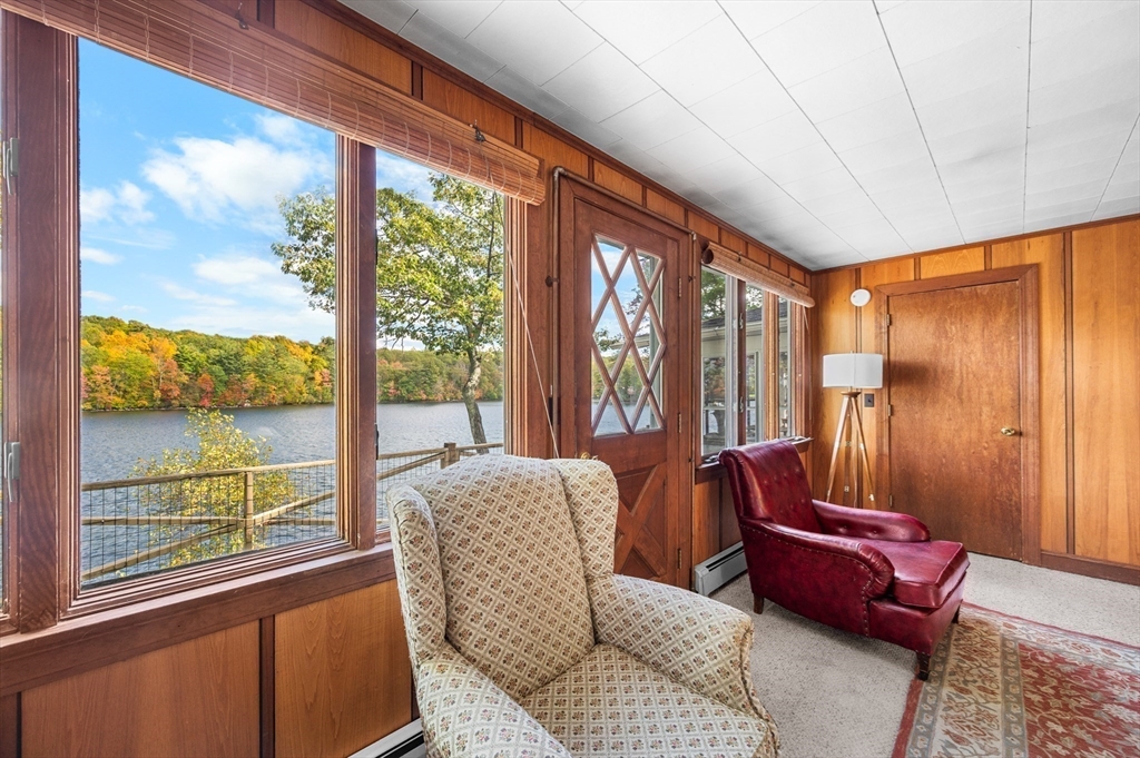 95 Crockett Road Upton, MA 01757 - Photo 19 of 26 a living room with furniture and large windows