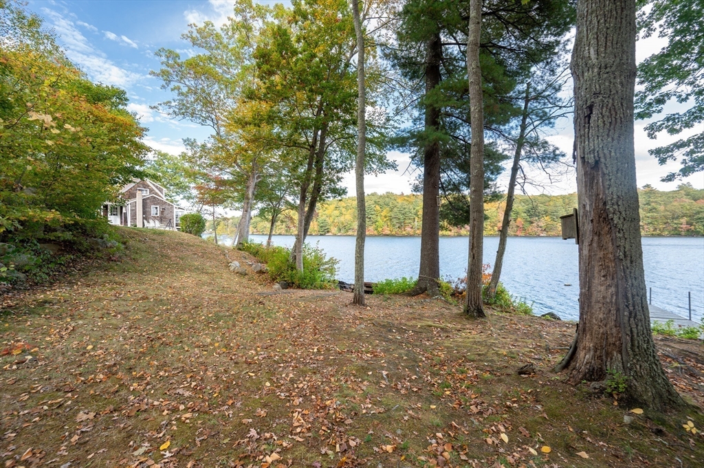 95 Crockett Road Upton, MA 01757 - Photo 22 of 26 a view of a yard with a tree