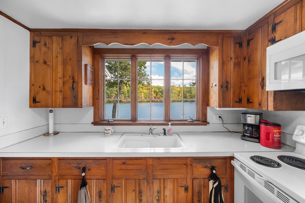95 Crockett Road Upton, MA 01757 - Photo 9 of 26 a kitchen with a sink and a window