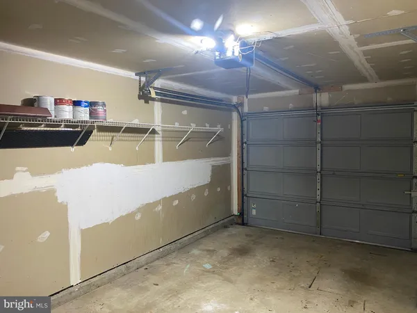 a view of a house with a street