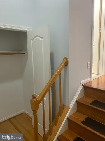 a view of entryway with wooden floor