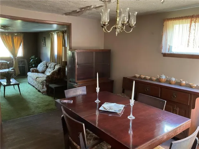 a workspace with furniture and window