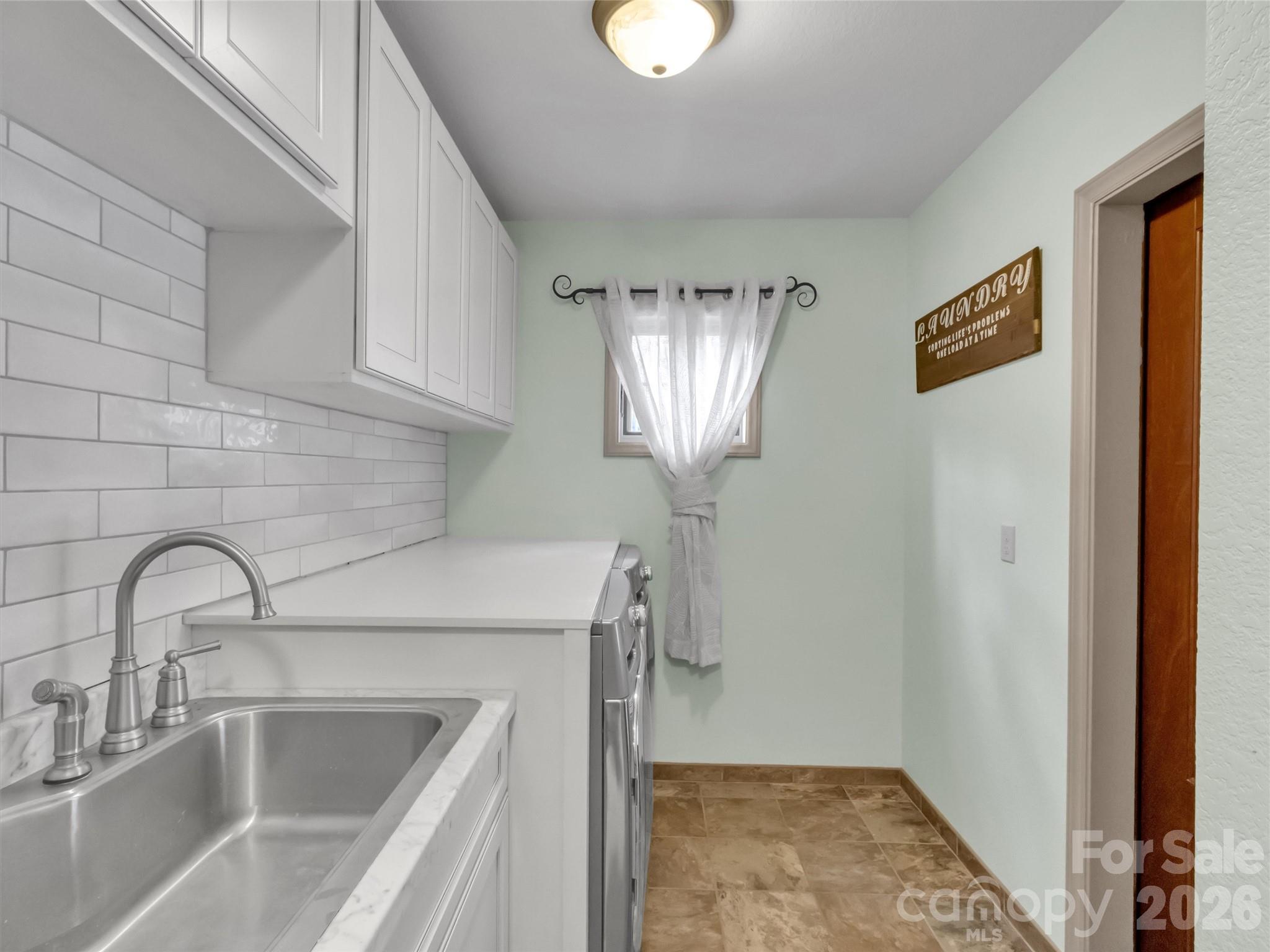 115 Fugitive Run Sylva, NC 28779 - Photo 16 of 47 a close view of sink and tap