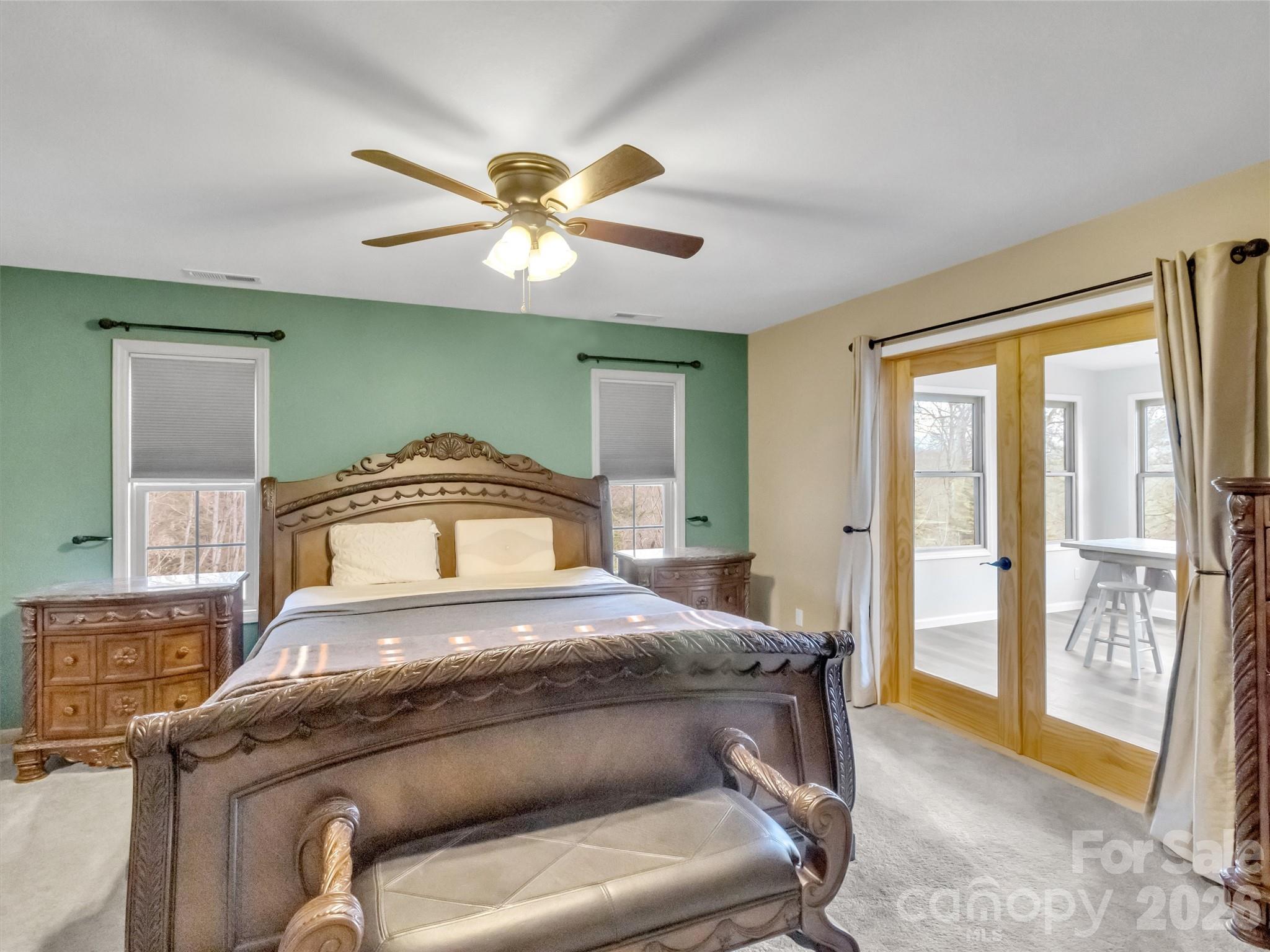 115 Fugitive Run Sylva, NC 28779 - Photo 17 of 47 a bedroom with a bed and a large window