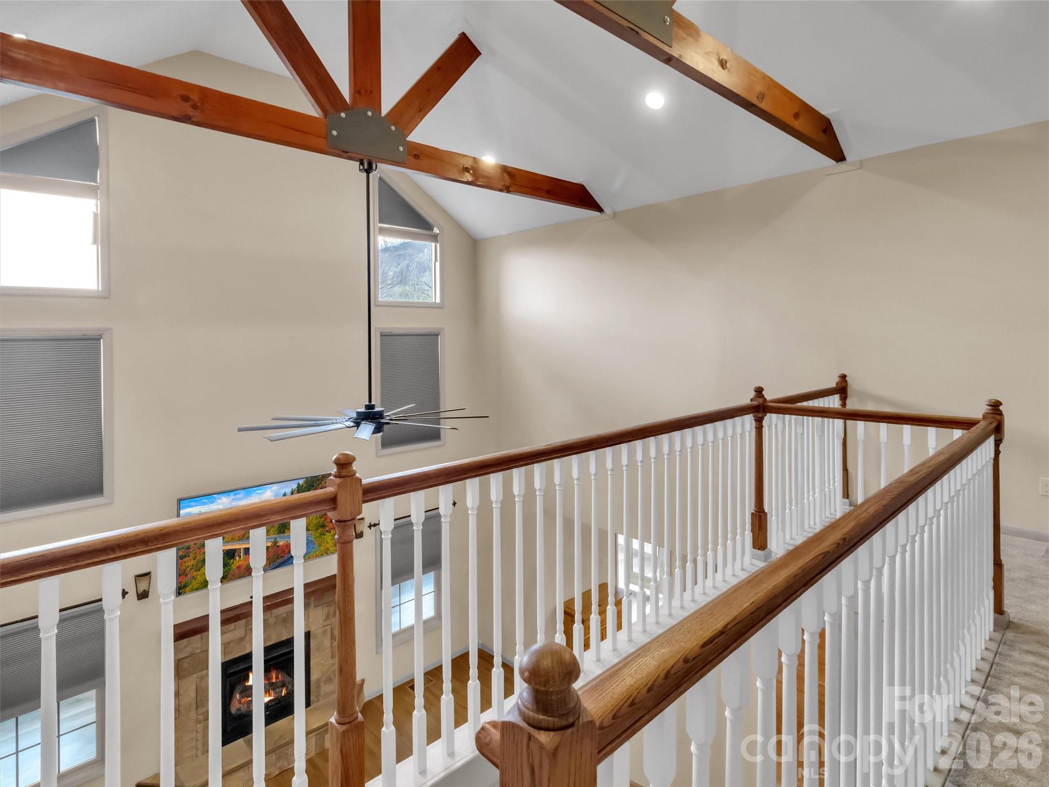 115 Fugitive Run Sylva, NC 28779 - Photo 20 of 47 a view of staircase with railing and white walls
