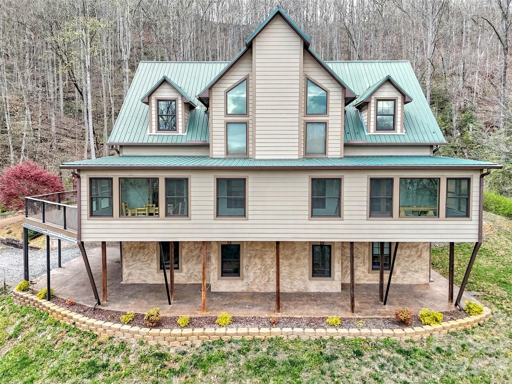 115 Fugitive Run Sylva, NC 28779 - Photo 2 of 47 a front view of a house with a yard