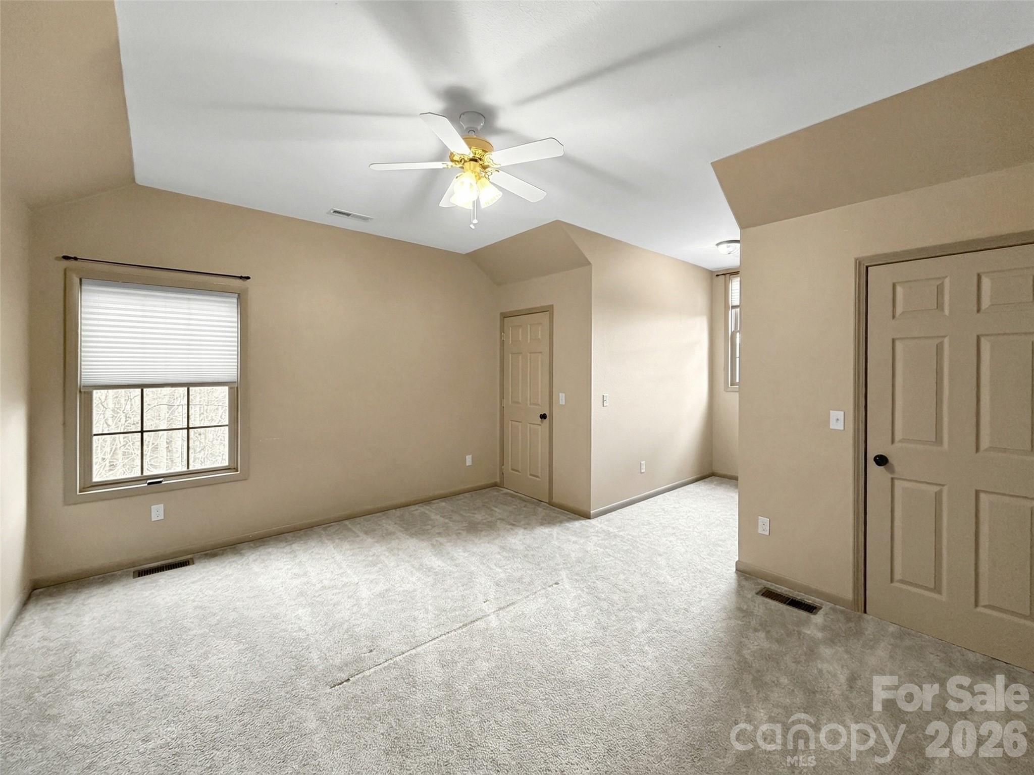 115 Fugitive Run Sylva, NC 28779 - Photo 23 of 47 an empty room with fan and windows