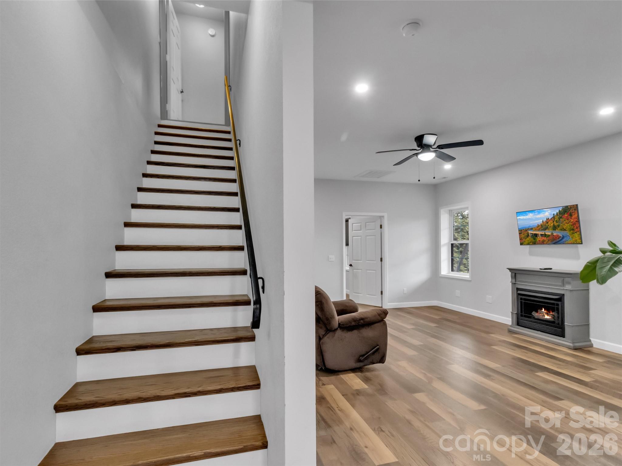115 Fugitive Run Sylva, NC 28779 - Photo 24 of 47 a living room with furniture and a fireplace