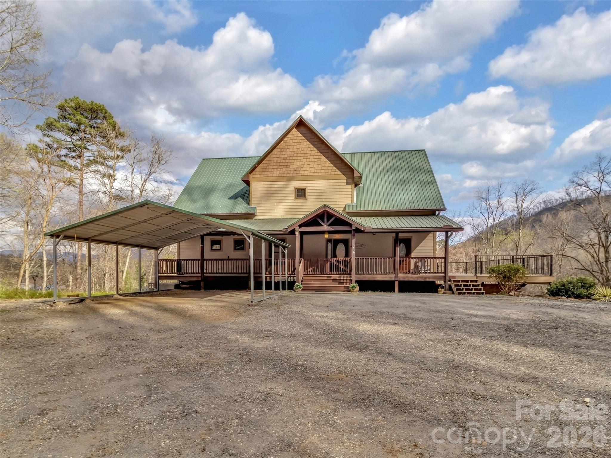 115 Fugitive Run Sylva, NC 28779 - Photo 42 of 47 a big house with a table and chairs
