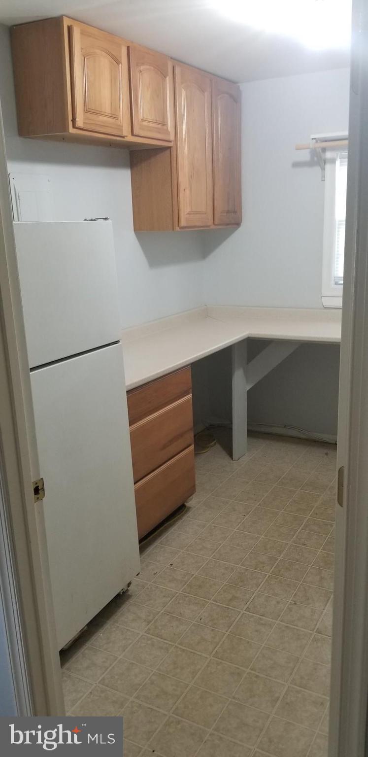 921 Waugh Chapel Road Gambrills, MD 21054 - Photo 22 of 54 Laundry Room: Storage/Countertop & 2ndRefrigerator