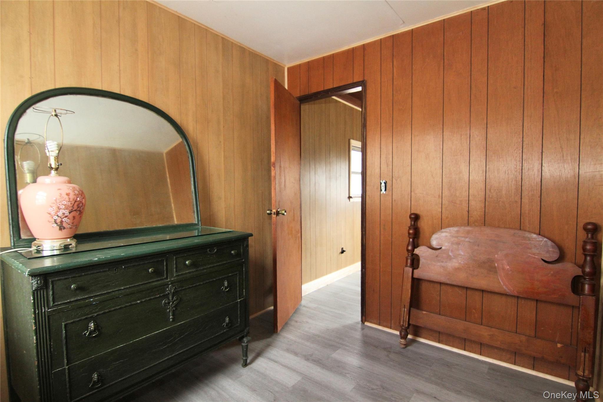 35 Glanhope Road, Unit 18 Hopewell Junction, NY 12533 - Photo 14 of 25 a bedroom with a bed and a mirror on dresser