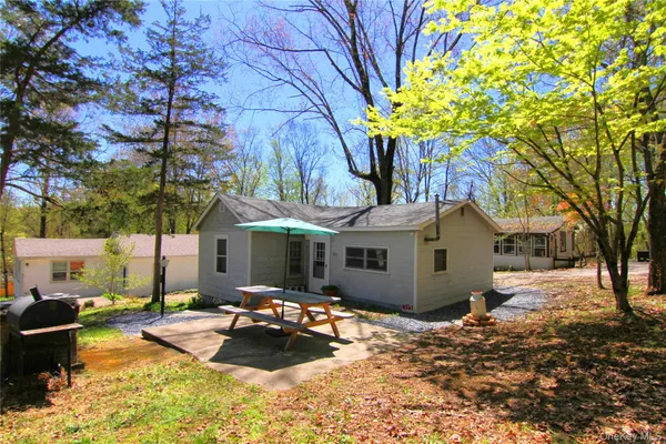 a view of a house with a patio