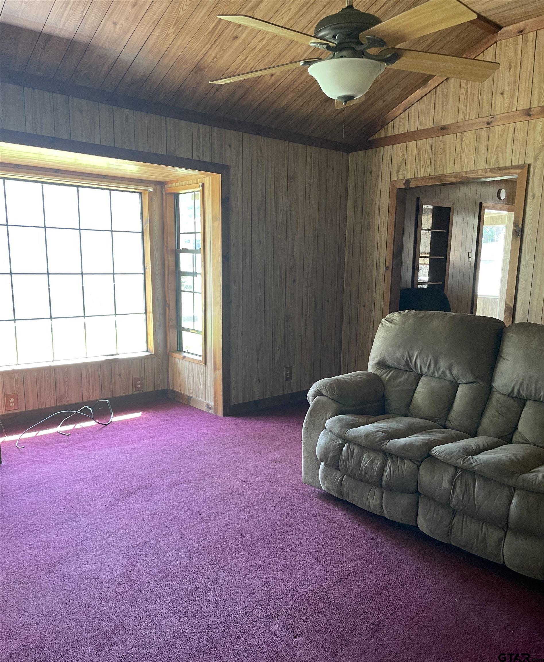 43 Private Road 52034 Pittsburg, TX 75686 - Photo 4 of 19 a living room with furniture and a large window