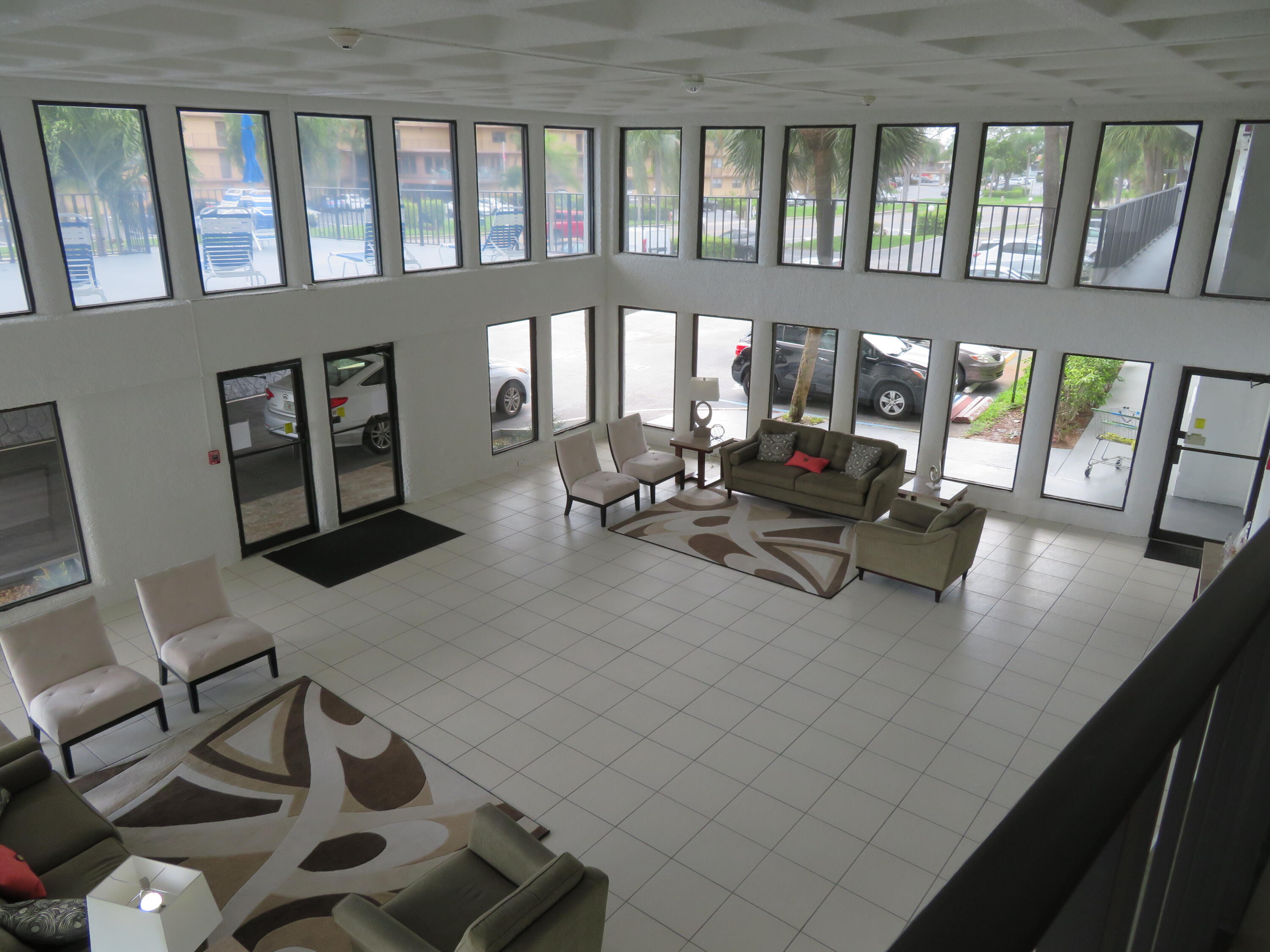 9233 Southwest 8th Street, Unit 117 Boca Raton, FL 33428 - Photo 14 of 37 24_9233_Bldg._Lobby