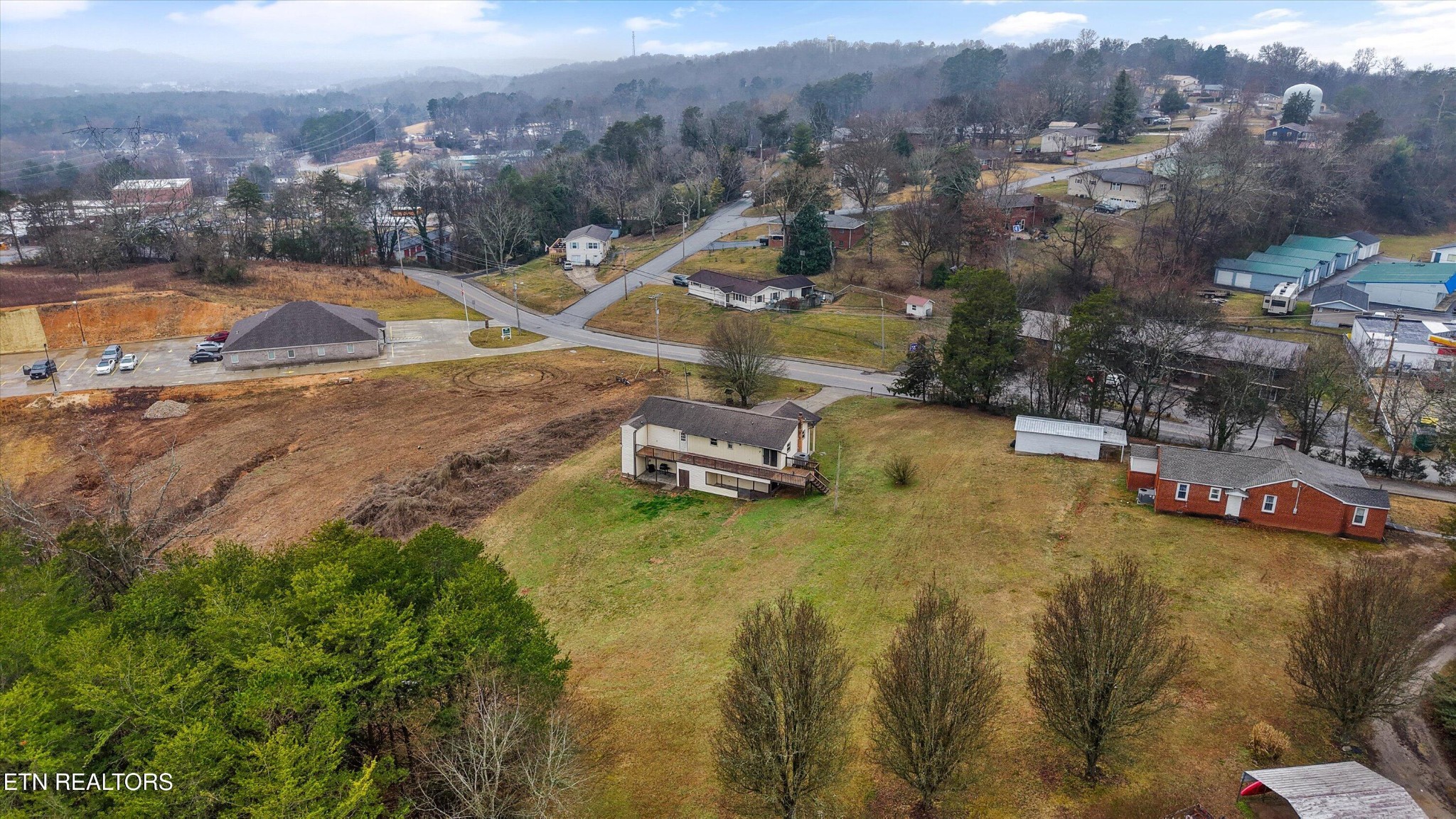 47 Paint Rock Ferry Road Kingston, TN 37763 - Photo 35 of 38 a view of a town with mountains in the background